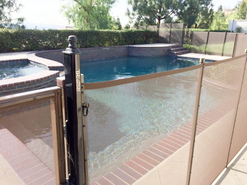 Mesh Pool Fence in Garden Setting